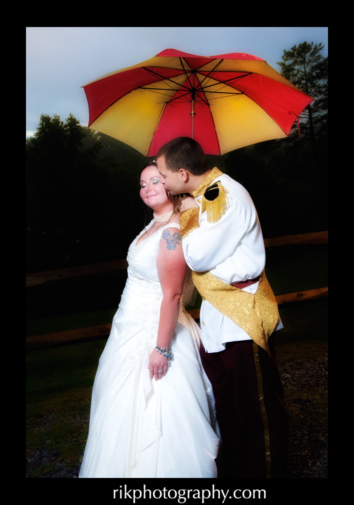 Prince charming kisses his bride. Bluff Mountain Inn Gatlinburg Wedding Venue