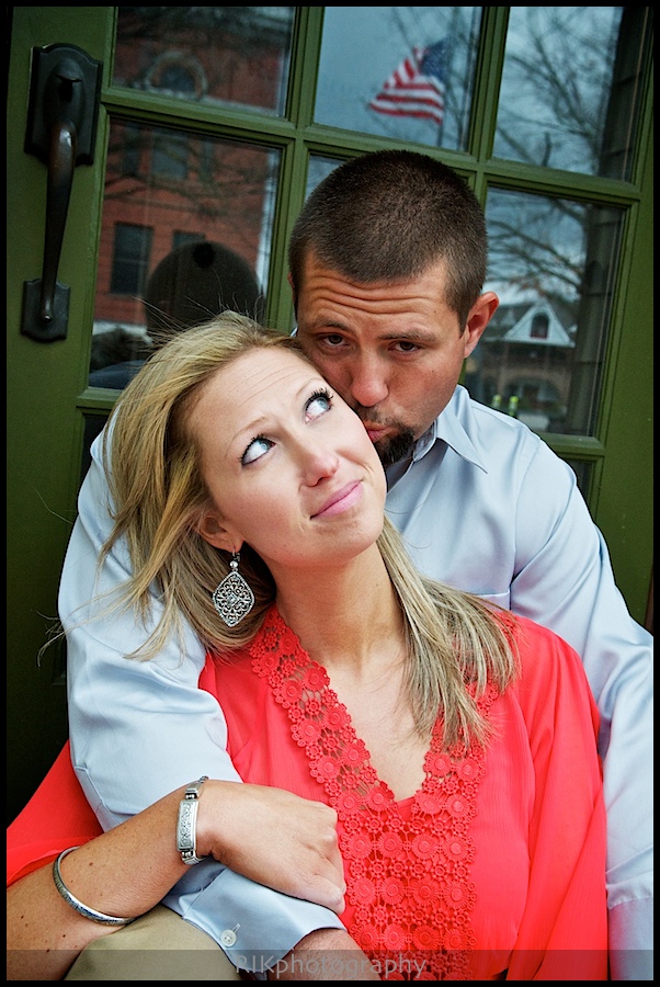 Cute pose of couple on the steps of an office in Sevierville