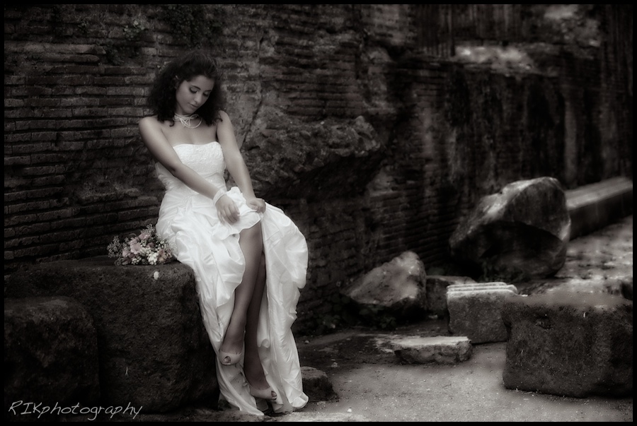 beautiful bride on the ruins of the Parthenon, Rome